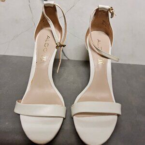 Aldo Size 7.5 white strap heels pre-owned  $12